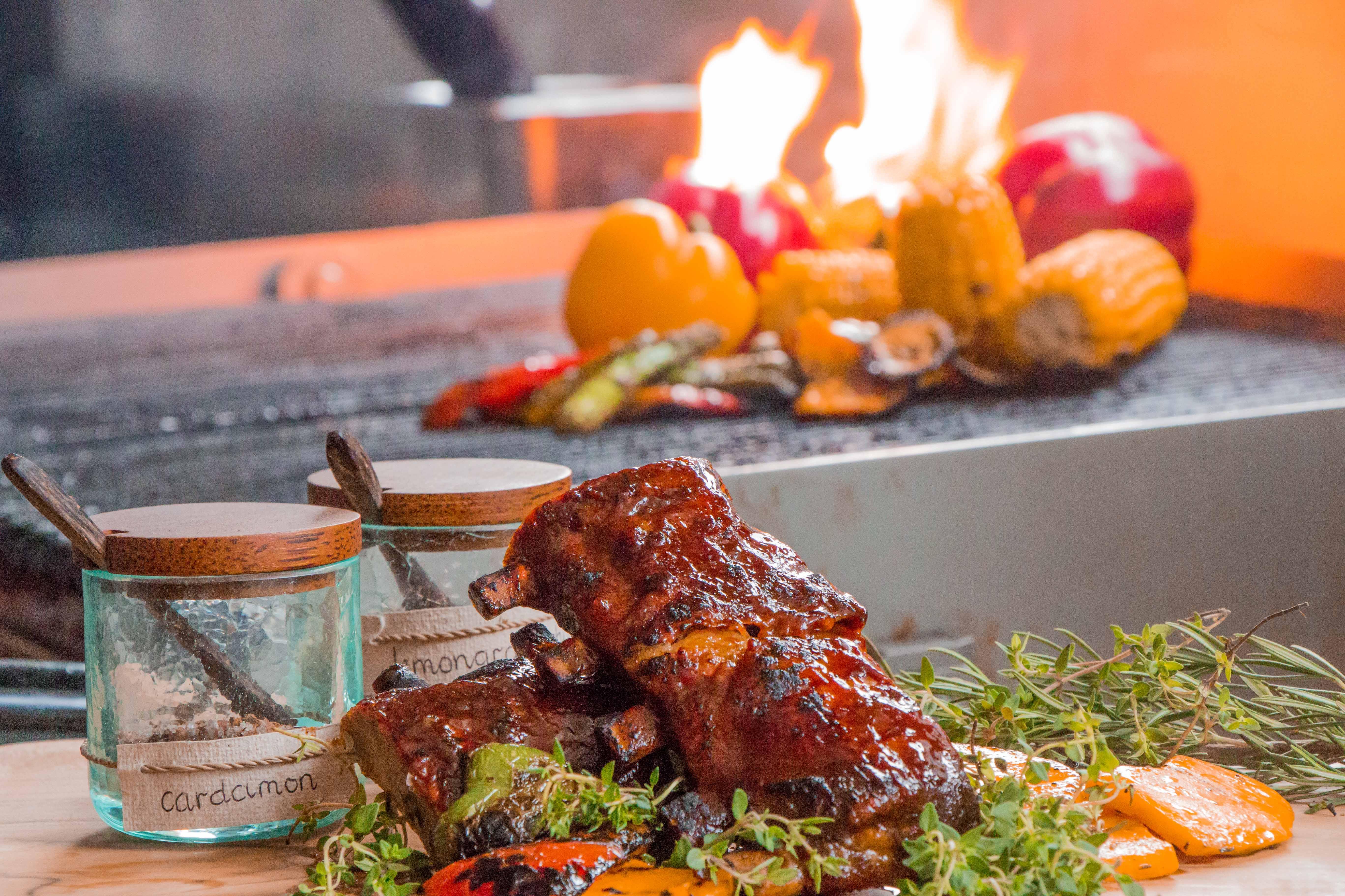 Montigo Resorts Seminyak Luaran gambar Cooking with wood