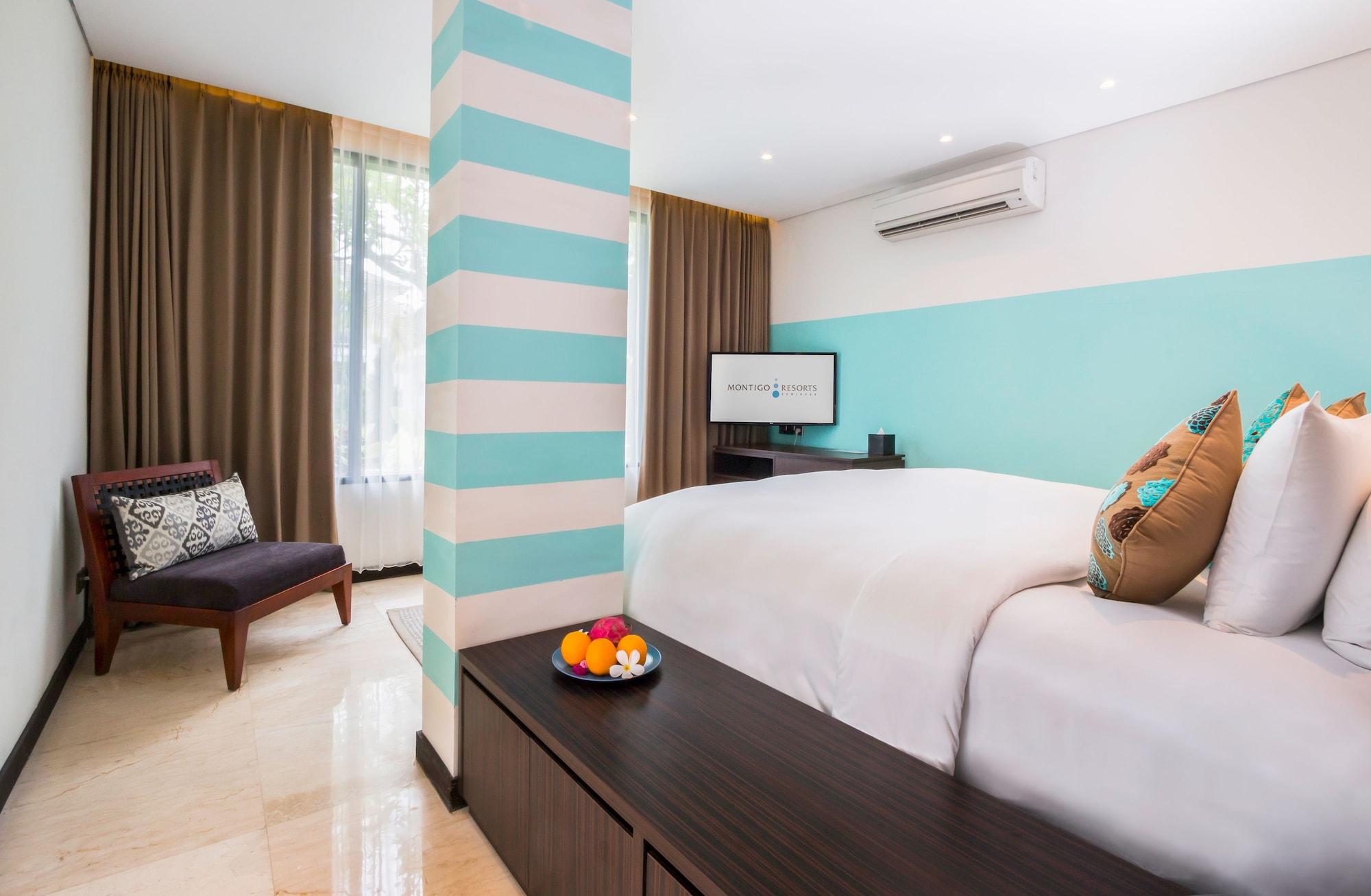 Montigo Resorts Seminyak Luaran gambar A bedroom at the hotel