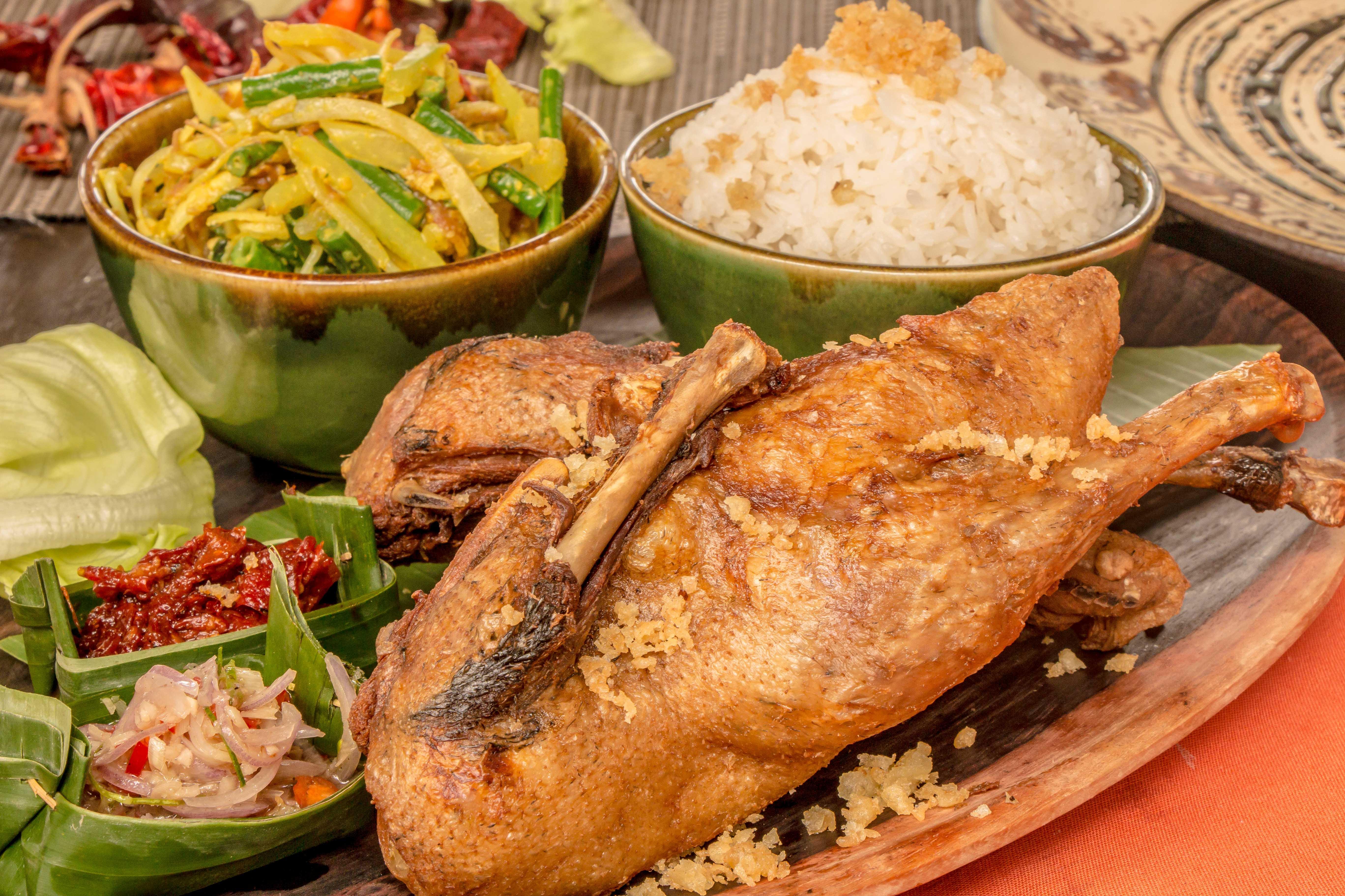 Montigo Resorts Seminyak Luaran gambar Fried fish with rice